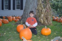 Tanner with a few pumpkins @ Stand Against Cancer.